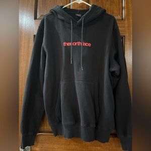 The North Face Black Hoodie with logo on back. Men’s Large.